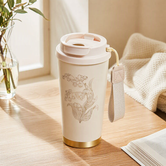Brewgleam™ 316 Stainless Steel Coffee Cup With Straw in a calm home setting