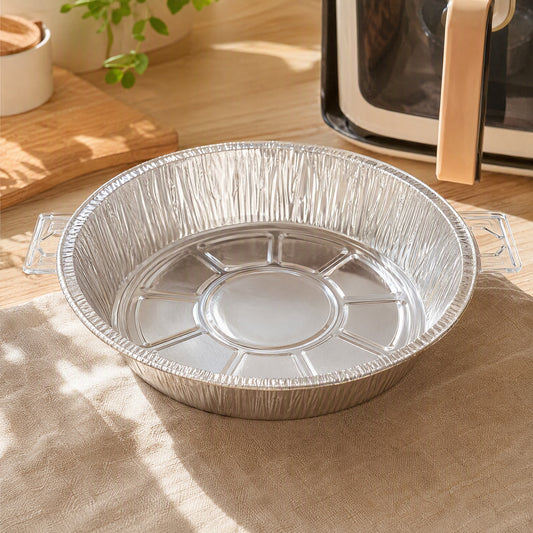 Foilnest™ Round Aluminum Foil Air Fryer Tray in a calm home setting