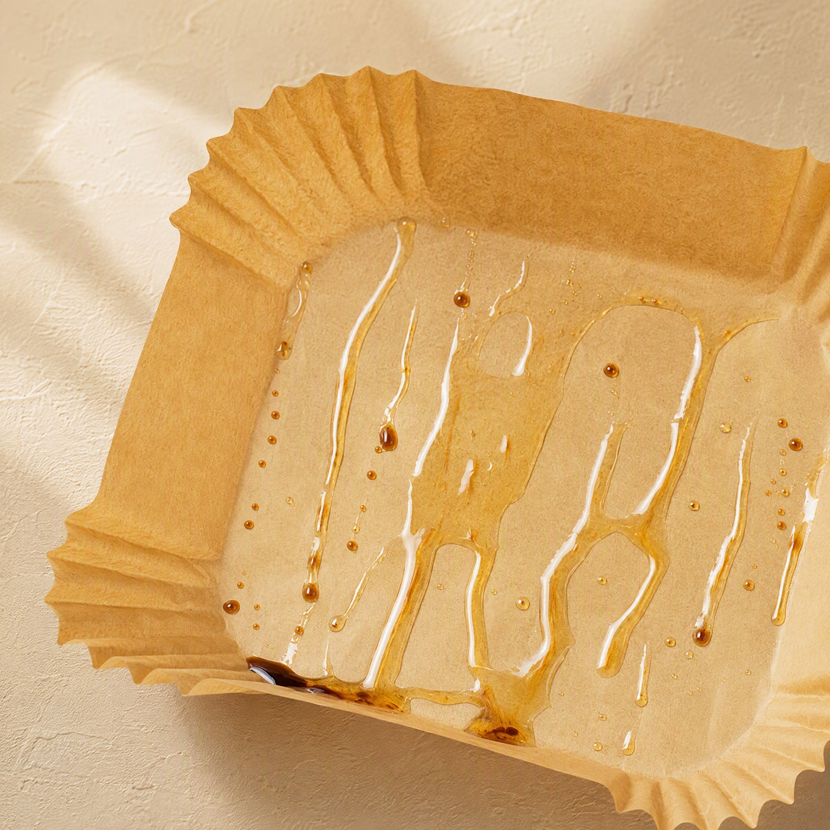 Fryliner™ Silicone Oil Air Fryer Paper, material and detail close-up