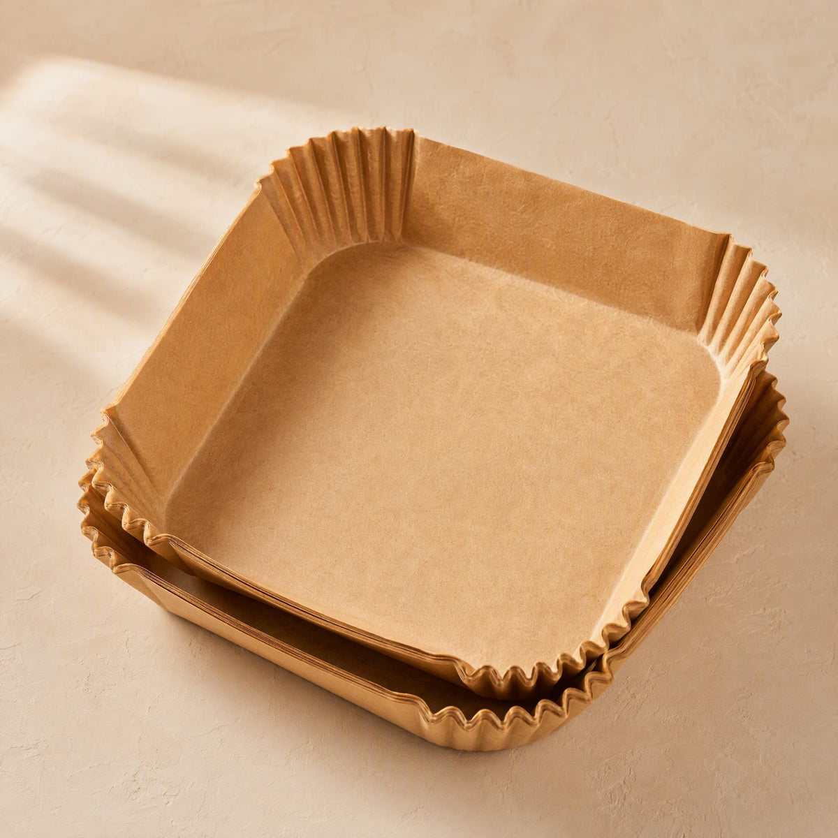 Fryshield™ Greaseproof Air Fryer Paper, material and detail close-up