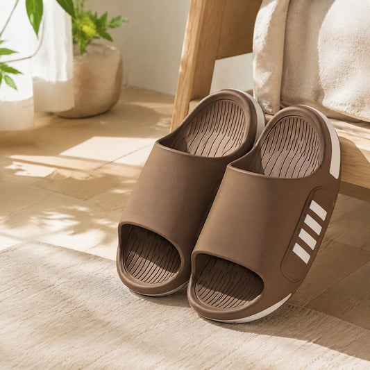 Slideease™ Men’s PVC Slide Sandals in a calm home setting
