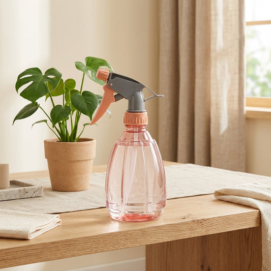 Sprayleaf™ Plastic Plant Watering Spray Can in a calm home setting
