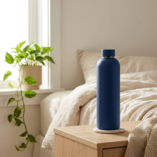 Steelpour™ 304 Stainless Steel Water Bottle in a calm home setting