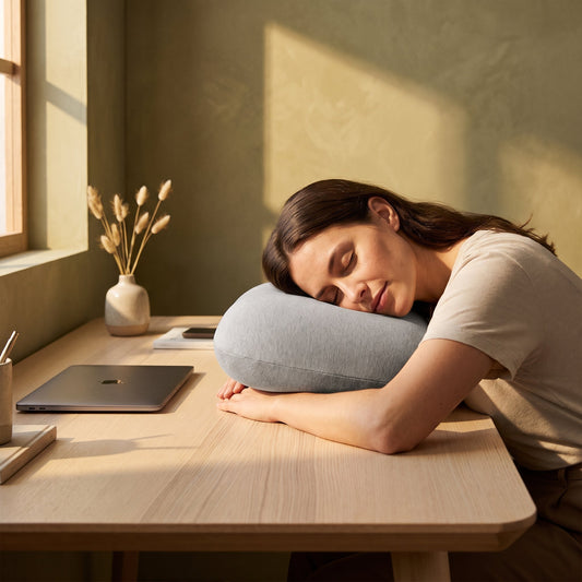 Midday desk nap on the Doze™ Desk Nap Pillow