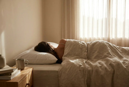 Editorial illustration of a side sleeper on a plain pillow; video below shows Amity