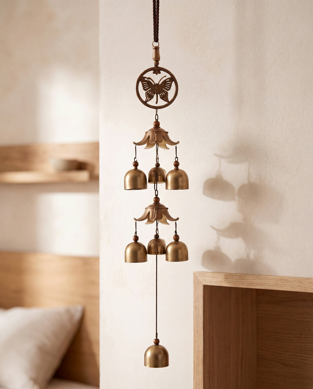 Aria Brass Bell Wind Chime in a Calm Eden lifestyle setting