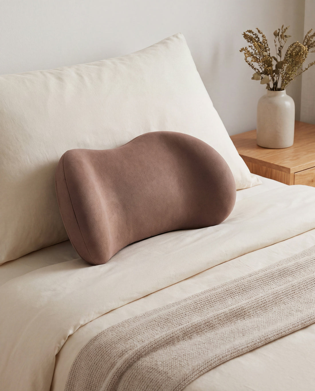 Crescent Lumbar Support Pillow in a Calm Eden lifestyle setting
