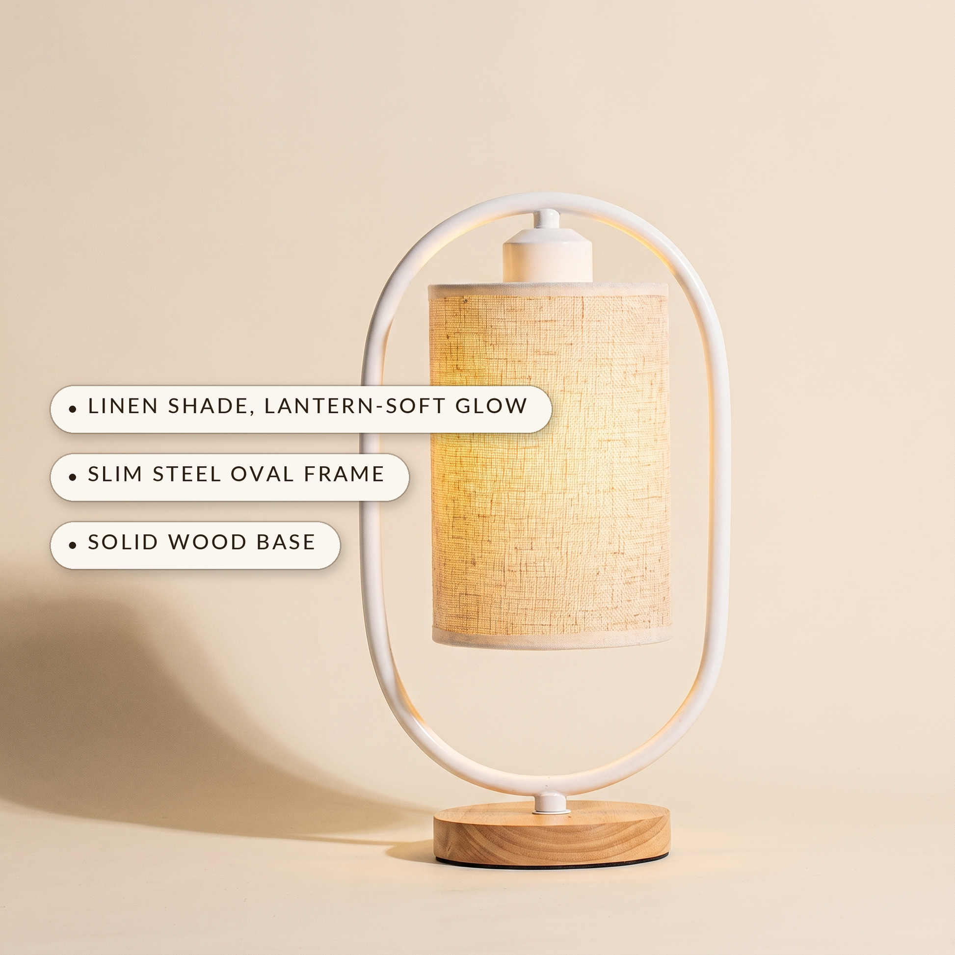 Hoop™ Lantern Table Lamp — linen shade lantern-soft glow, slim steel oval frame, solid wood base