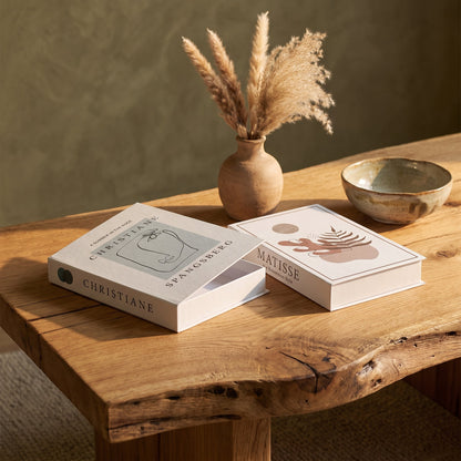 Folio™ Book Storage Boxes styled on a live-edge oak coffee table