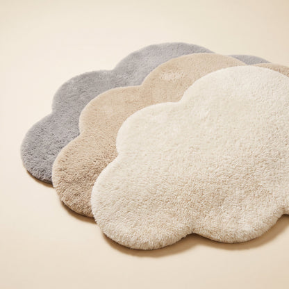 Plume™ Plush Bedside Rug — cream, oat and grey cloud-shaped rugs on warm cream background