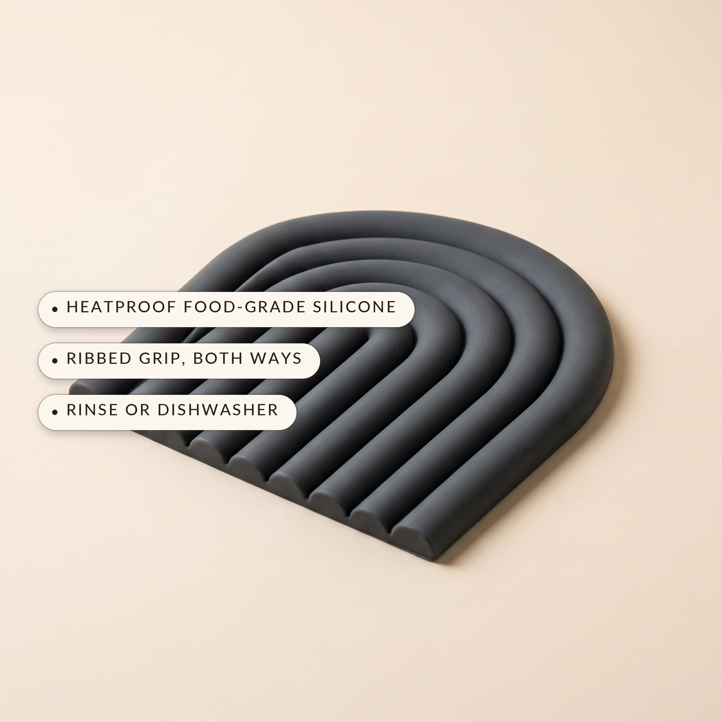 Vault™ Arch Trivet — heatproof food-grade silicone, ribbed grip both ways, dishwasher safe