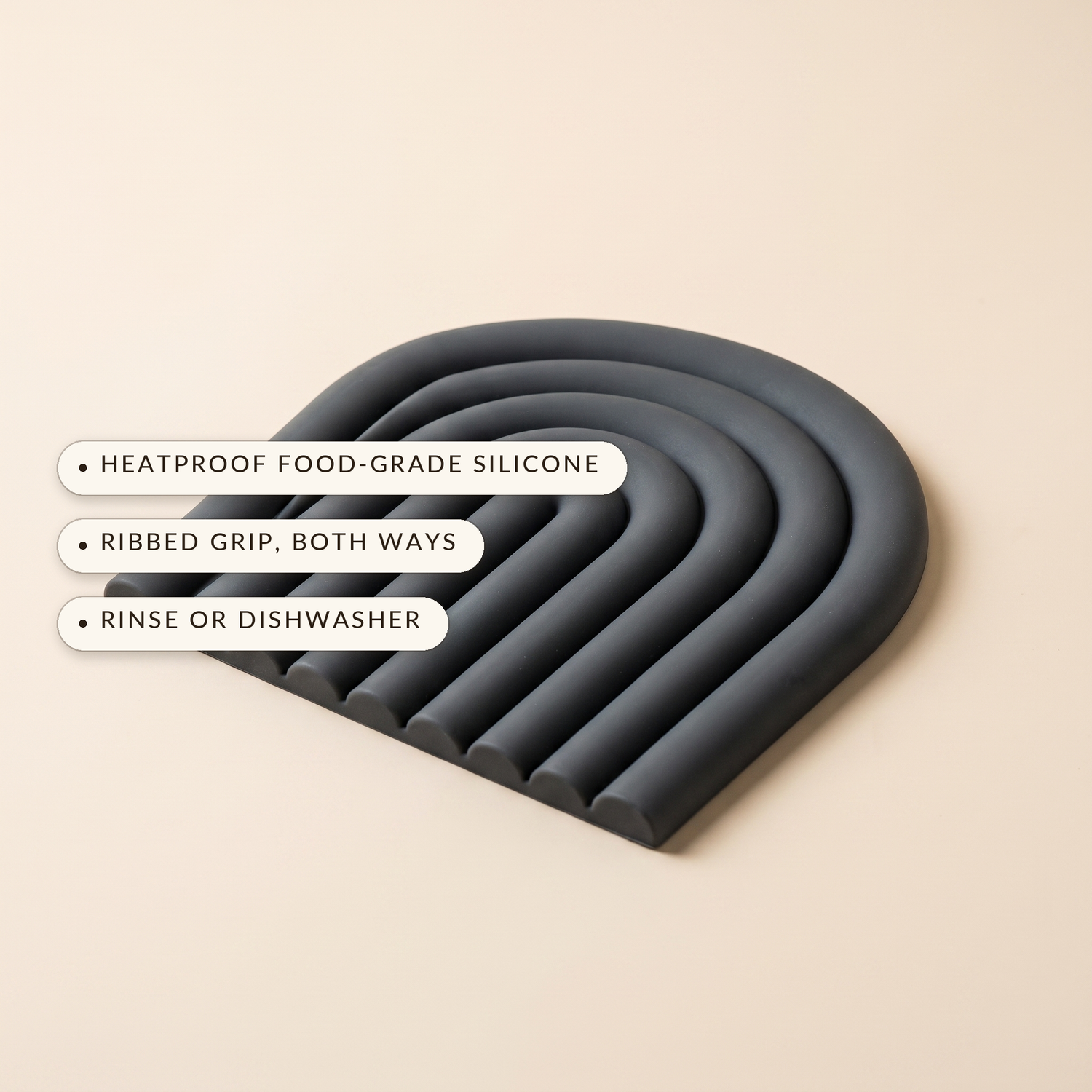 Vault™ Arch Trivet — heatproof food-grade silicone, ribbed grip both ways, dishwasher safe