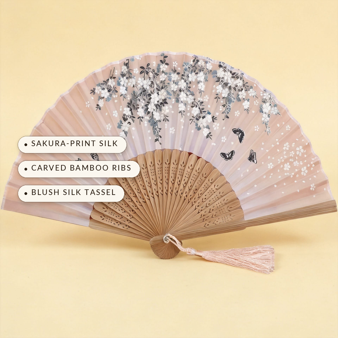 Sakura™ Silk Hand Fan — sakura-print silk, carved bamboo ribs, blush silk tassel
