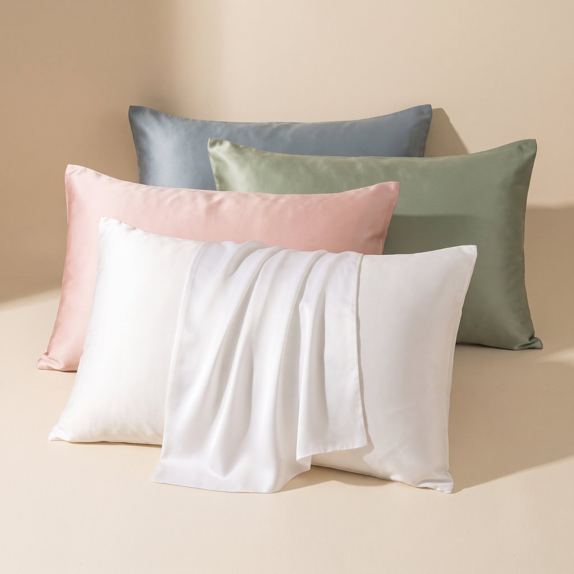 Mulberry™ Silk Pillowcase — white, blush, sage and mist silk pillowcases on warm cream background