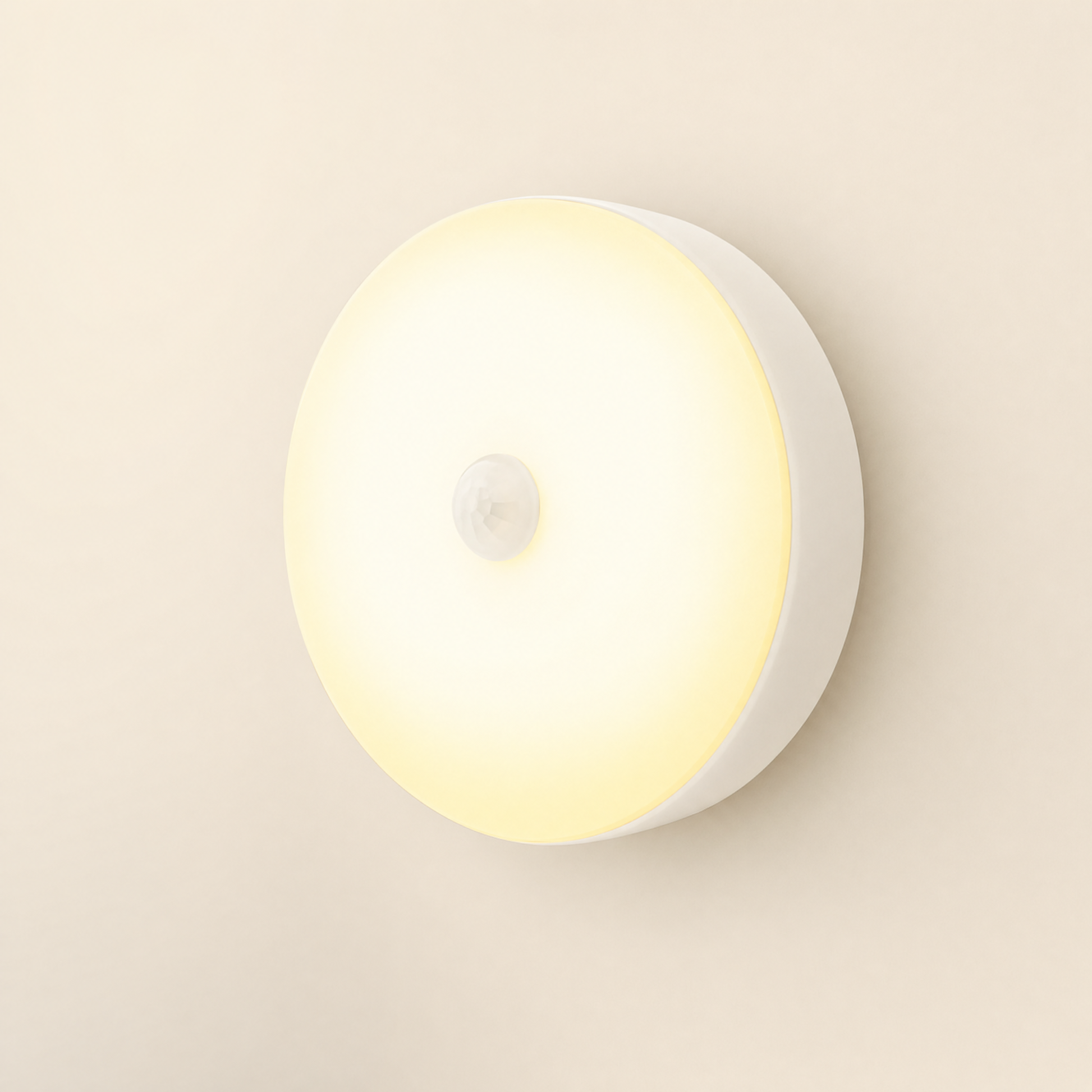 Halo motion night light glowing warm on cream backdrop