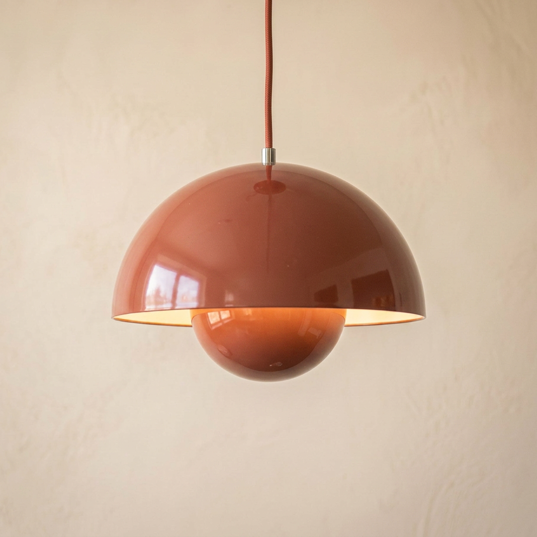 Bud pendant light in Terracotta, a warm brick red lacquer shade