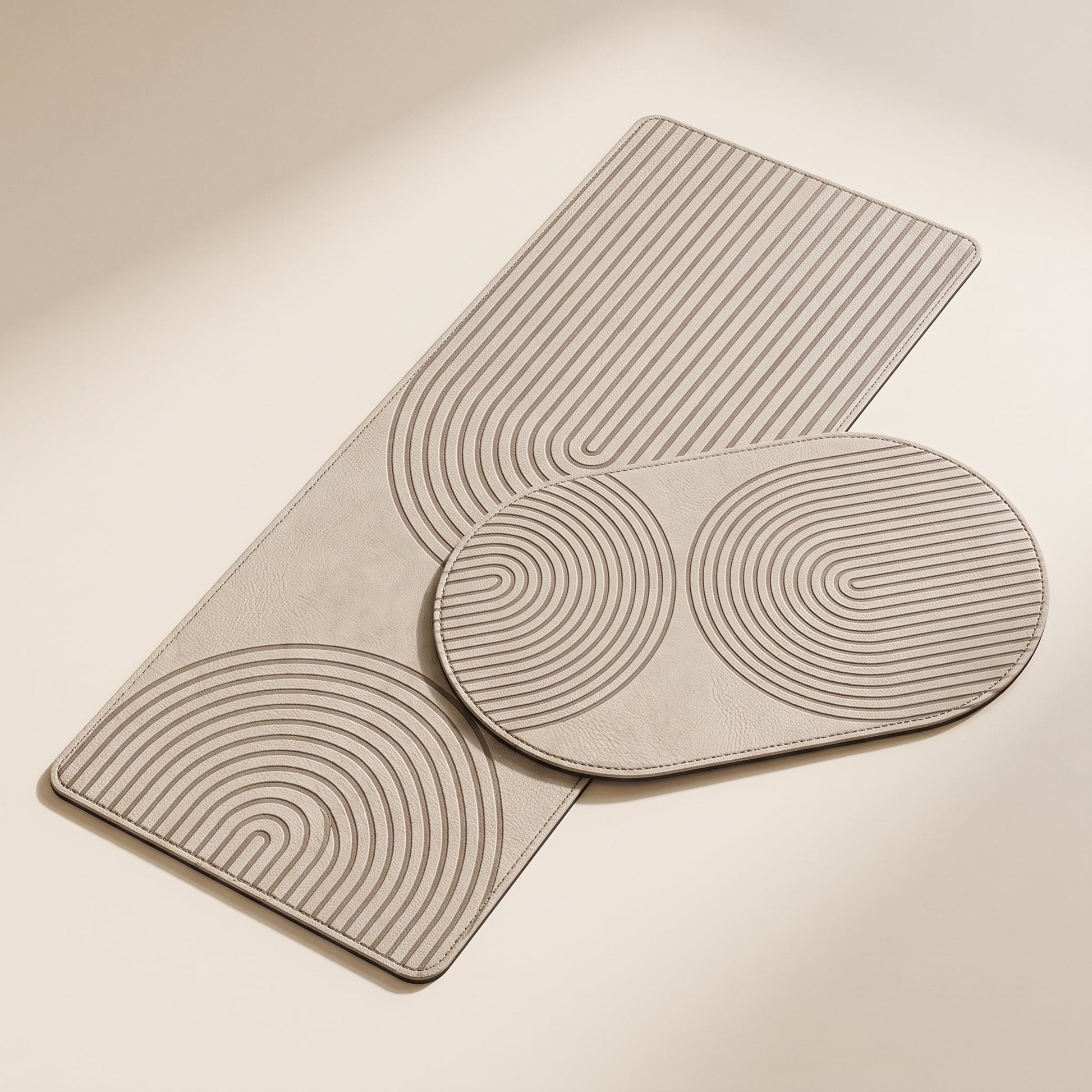 Stone™ Quick-Dry Kitchen Mat — greige runner and oval mats on warm cream background
