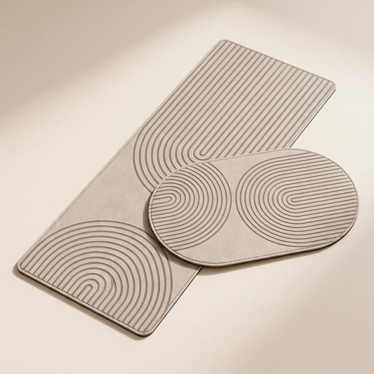 Stone™ Quick-Dry Kitchen Mat — greige runner and oval mats on warm cream background