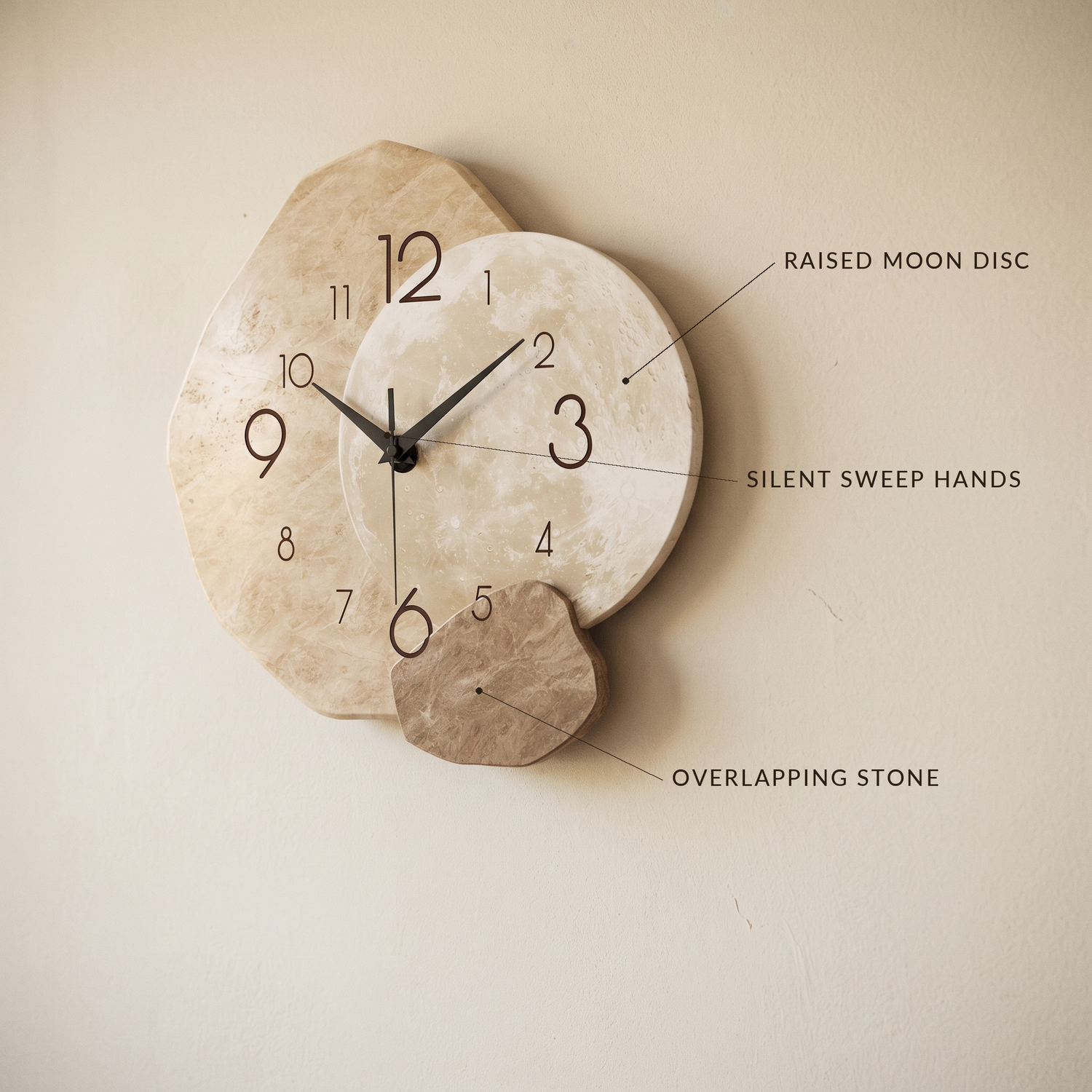 Cairn Clock with labels for the raised moon disc, silent sweep hands and overlapping stone