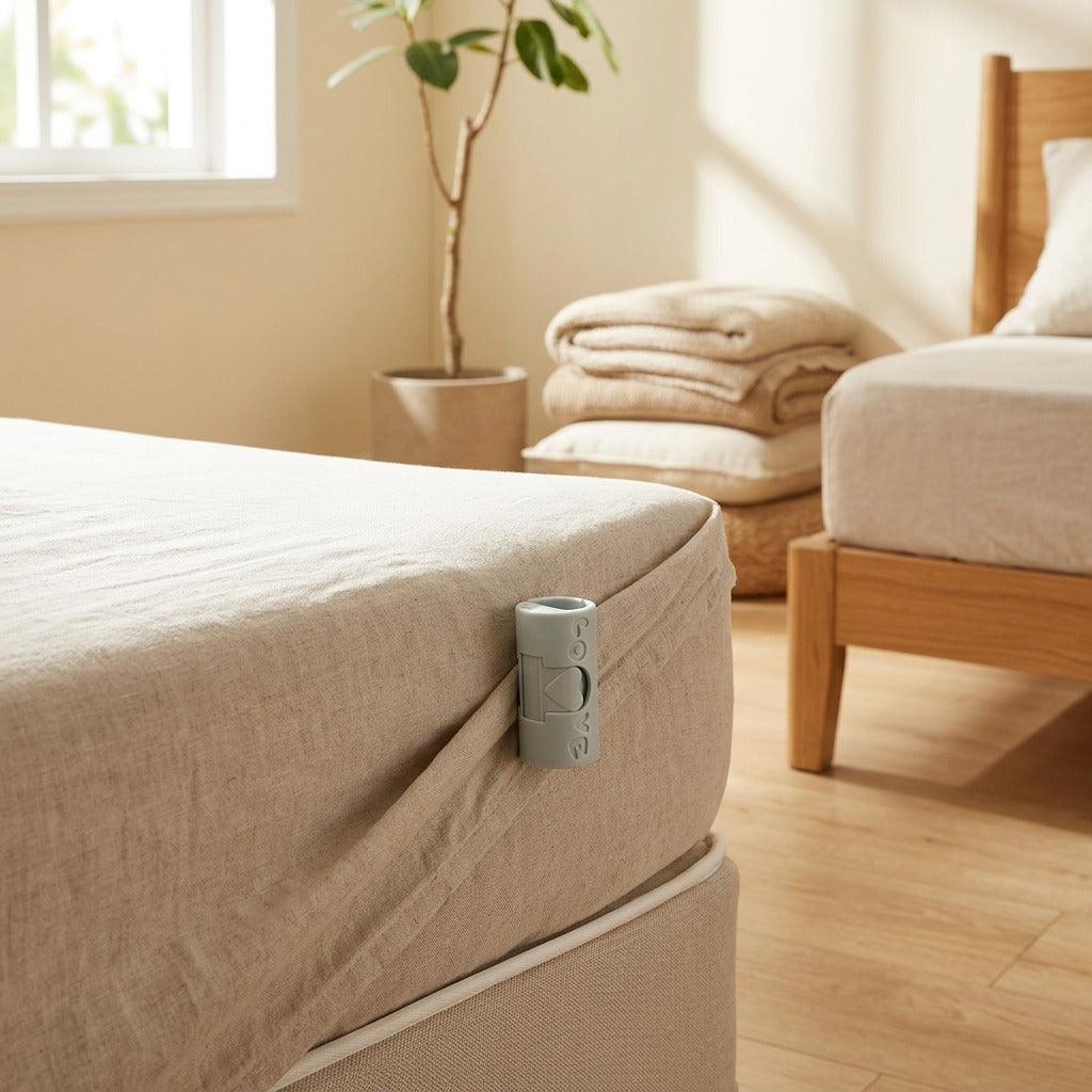 Snapkeep™ Plastic Bed Sheet Fastener Clip in a calm home setting