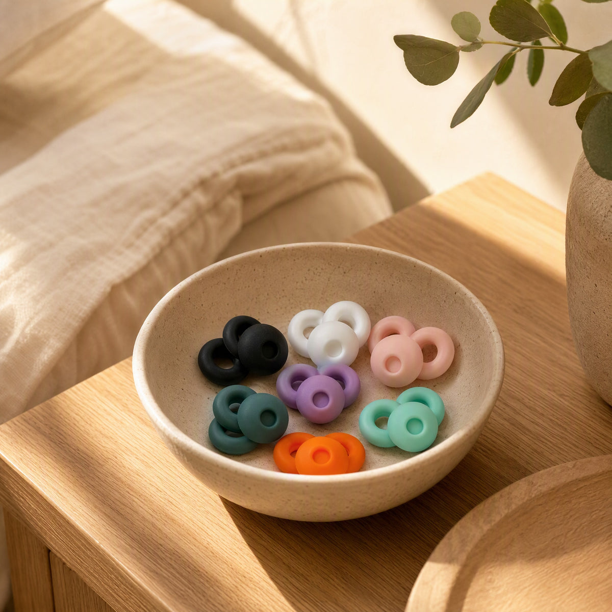 Quietseal™ Silicone Noise-Reducing Earplugs in a calm home setting
