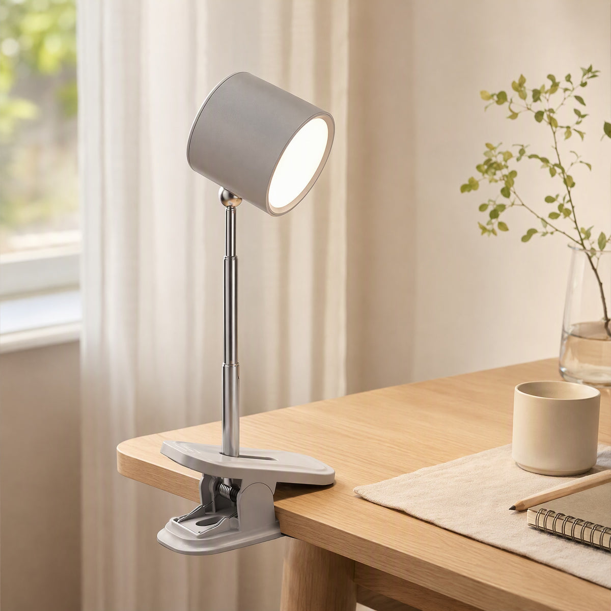 Clampglow™ Clamp-On Rechargeable LED Desk Lamp in a calm home setting