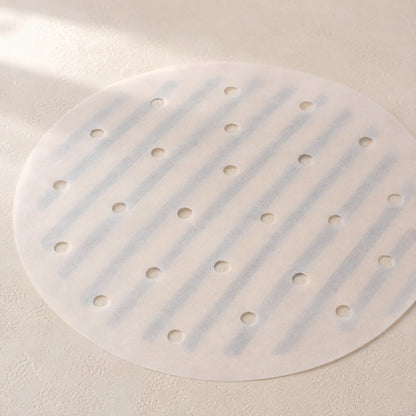 Crispring™ Round Air Fryer Parchment Paper, material and detail close-up