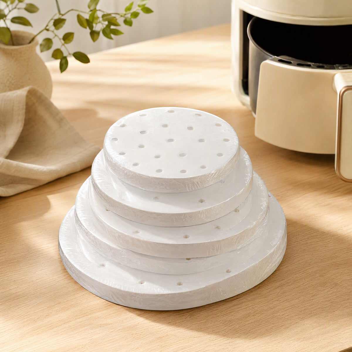 Crispring™ Round Air Fryer Parchment Paper in a calm home setting