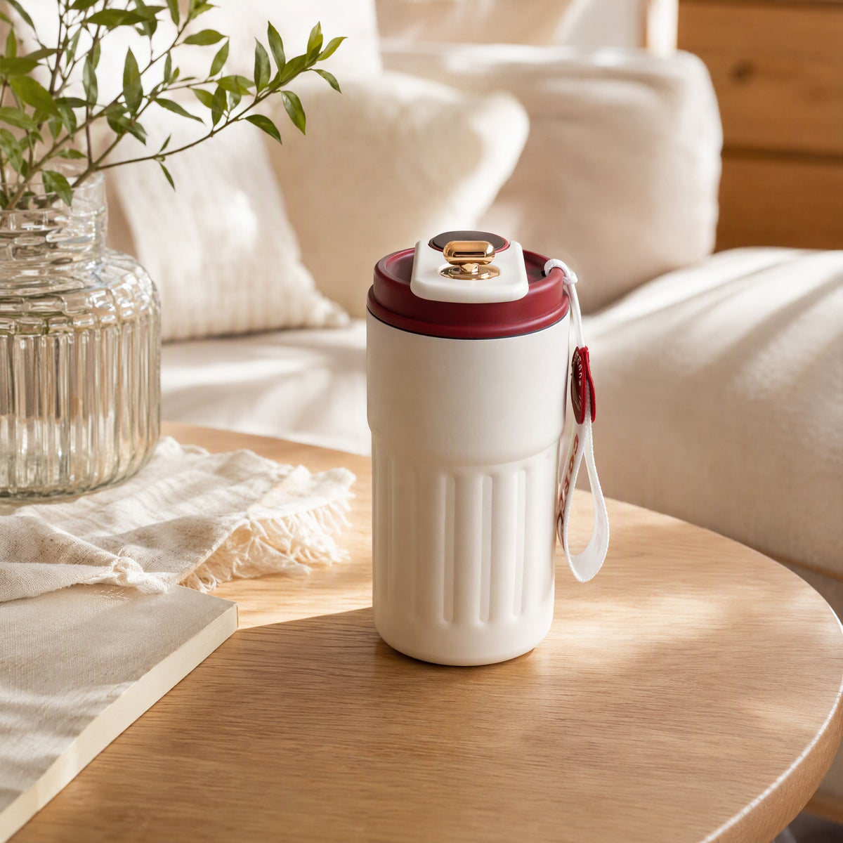 Tempmark™ Stainless Steel Temperature Display Thermos Cup in a calm home setting