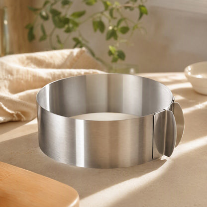 Ringform™ Stainless Steel Adjustable Cake Mold in a calm home setting