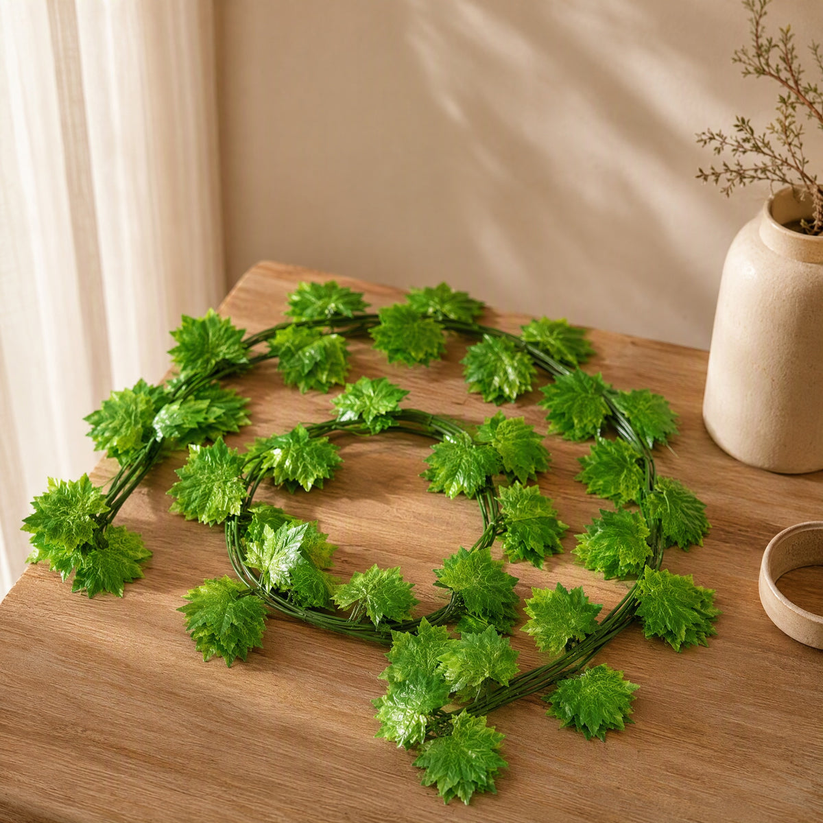 Leafwoven™ Artificial Maple Leaf Rattan Garland, styled close view