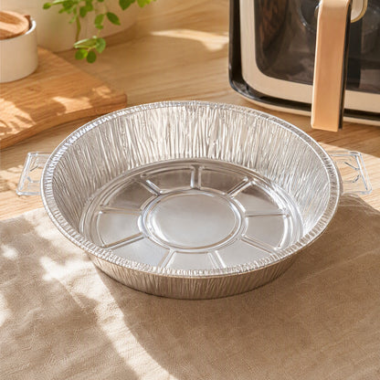 Foilnest™ Round Aluminum Foil Air Fryer Tray in a calm home setting