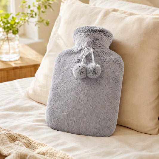 Snugheat™ Rubber Water-Injection Hot Water Bottle in a calm home setting