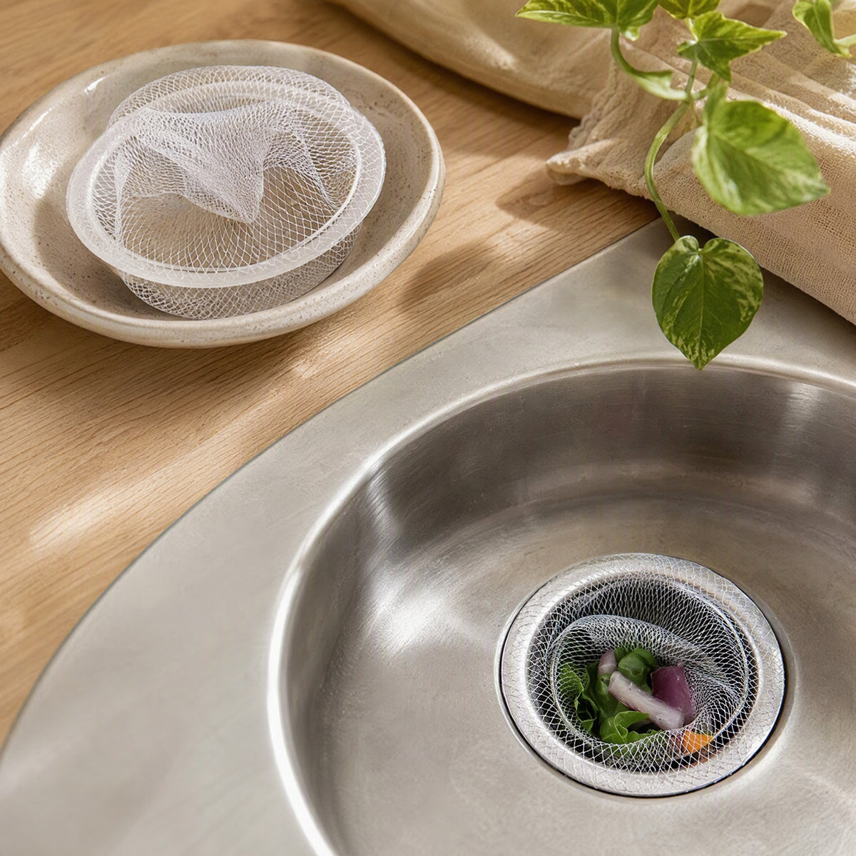 Meshpouch™ Plastic Kitchen Sink Filter Mesh Bag in a calm home setting