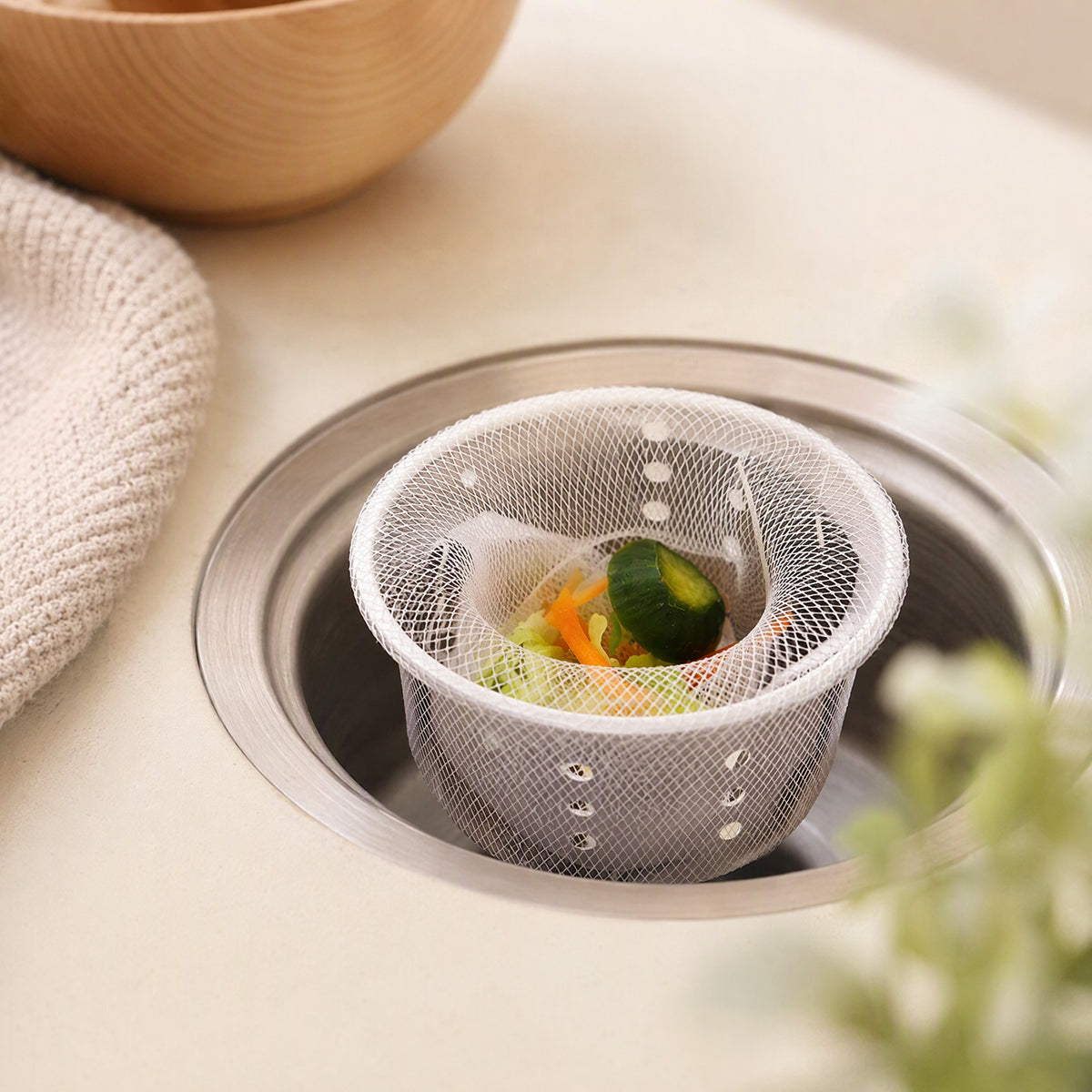 Meshpouch™ Plastic Kitchen Sink Filter Mesh Bag, styled close view