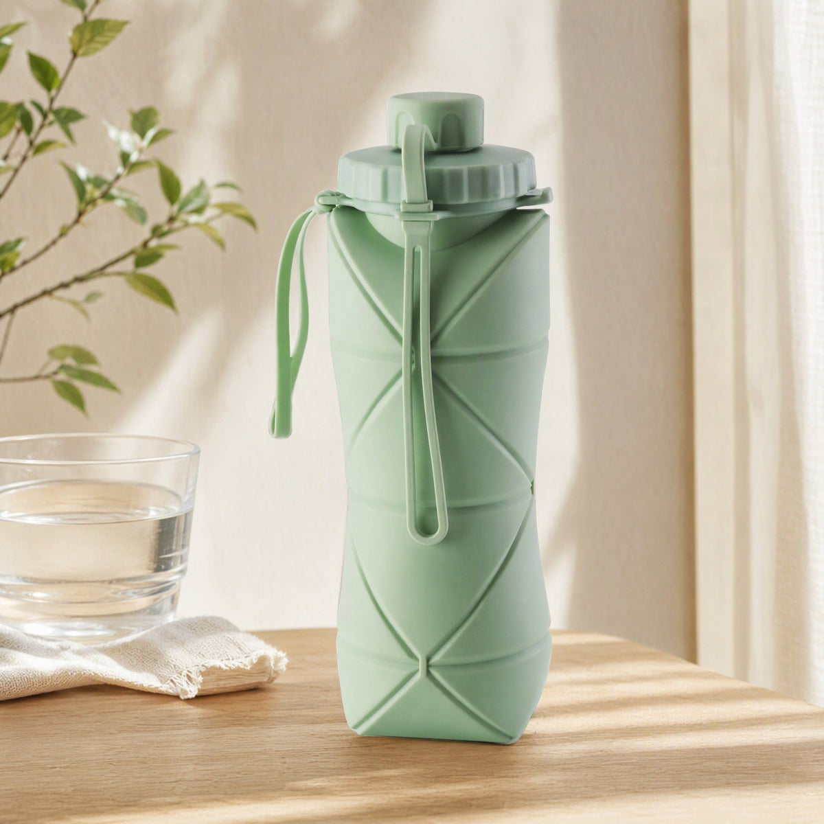 Sipfold™ Silicone Folding Water Cup in a calm home setting