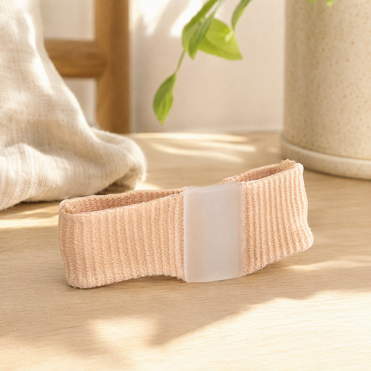 Toebrace™ Silicone Big Toe Separator Brace in a calm home setting