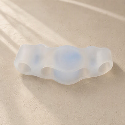 Toetriad™ Silicone Three-Hole Toe Separator, material and detail close-up