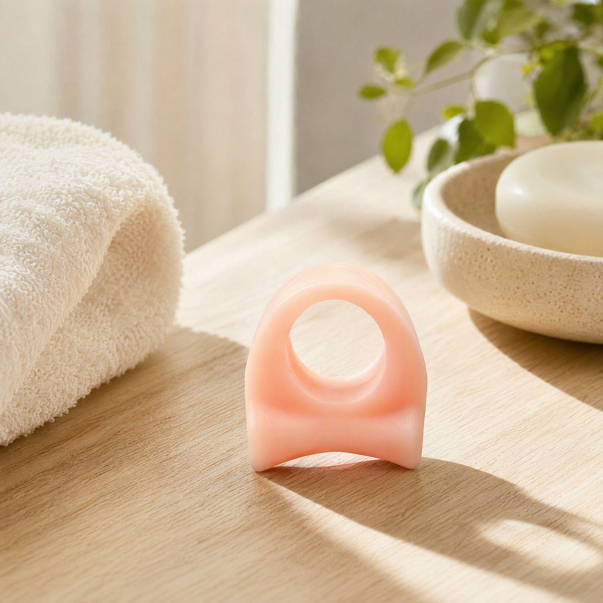 Toehalo™ Silicone Big Toe Separator Ring in a calm home setting