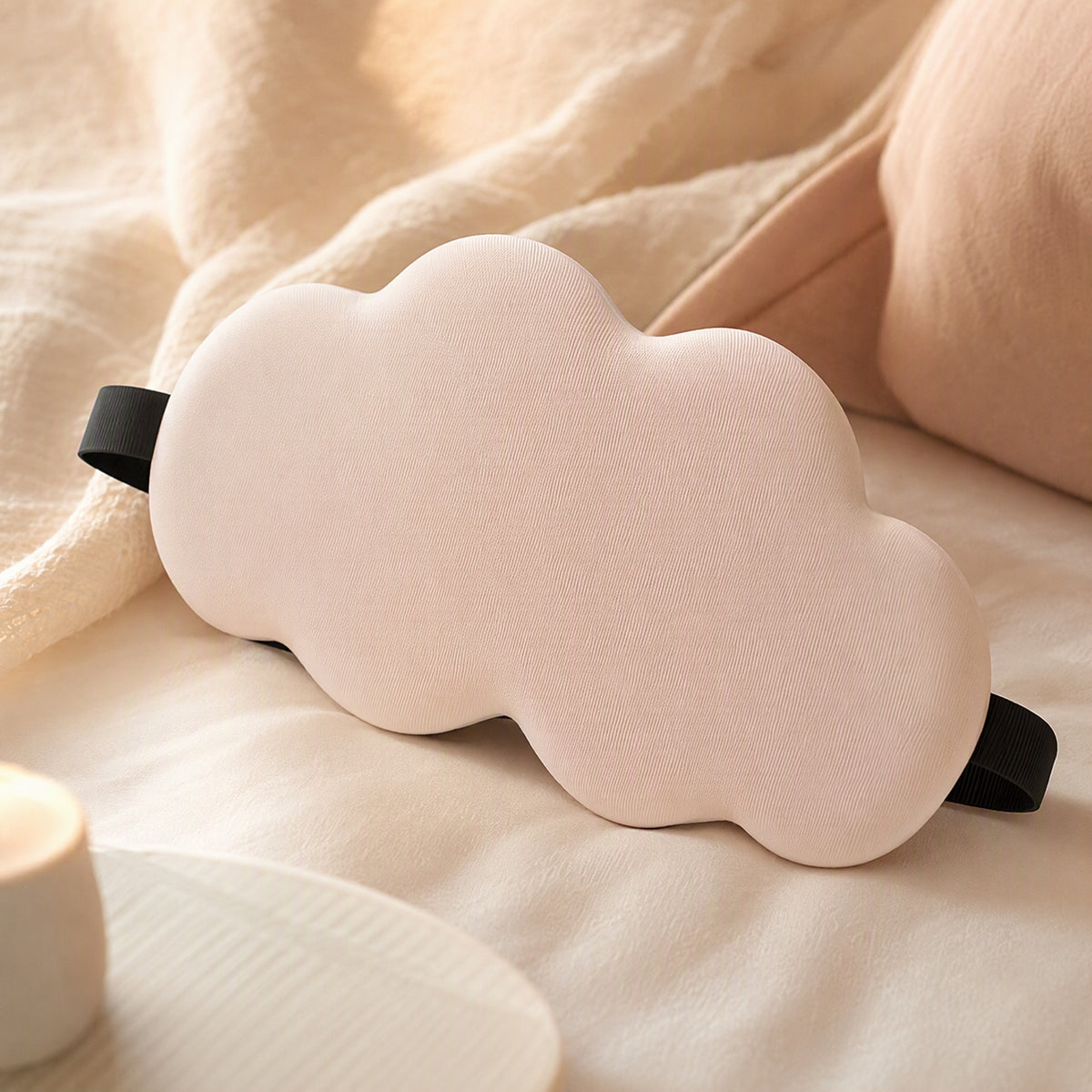 Dozecloud™ Cloud-Shaped Memory Foam Sleep Mask, styled close view