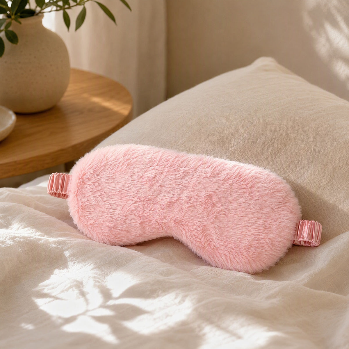 Dreamshade™ Plush Blackout Sleep Mask in a calm home setting