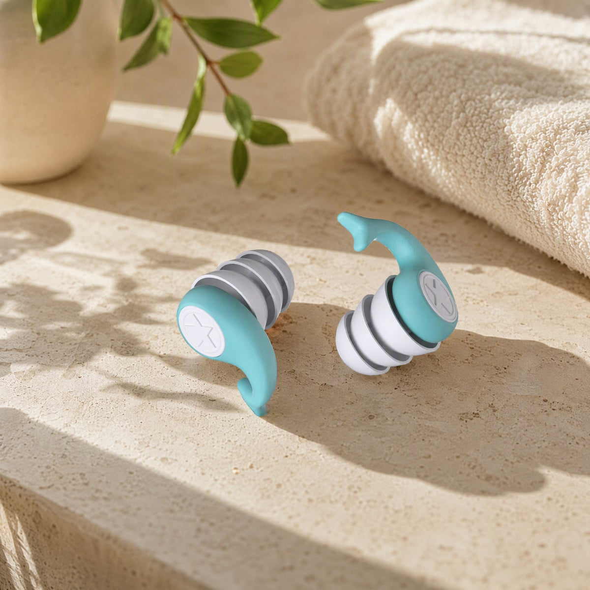 Swimhush™ Silicone Swimming Earplugs in a calm home setting