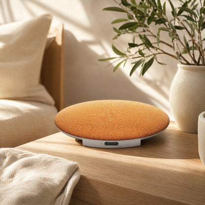Dreamdisc™ White Noise Bluetooth Speaker Disc in a calm home setting