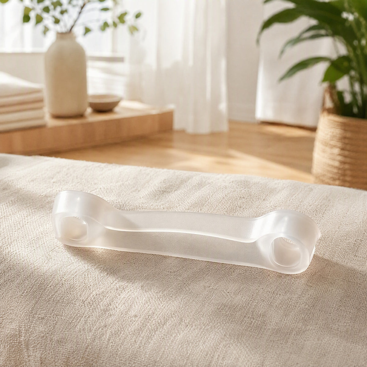 Toespring™ Silicone Toe Separator Tension Band in a calm home setting