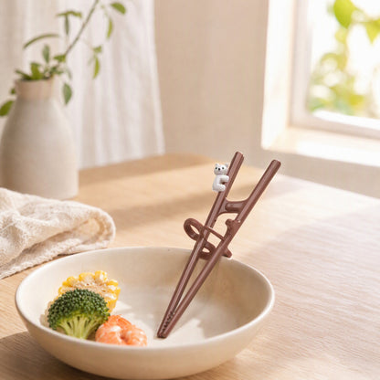 Pinchpath™ Plastic Training Chopsticks in a calm home setting
