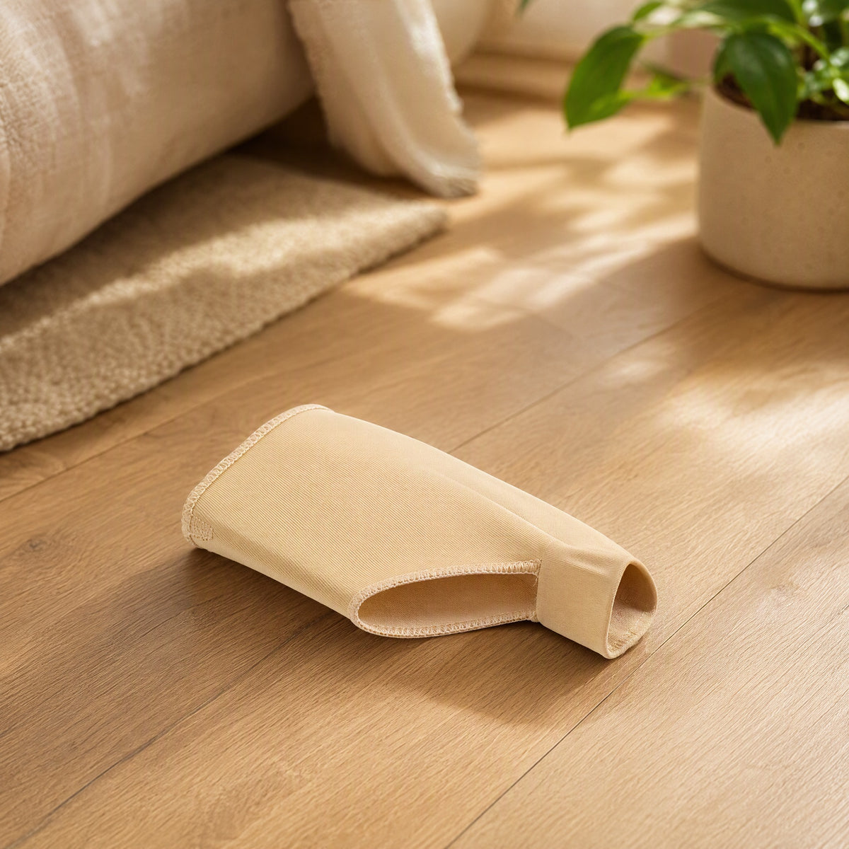 Cushstep™ Silicone Toe Separator With Cushion in a calm home setting