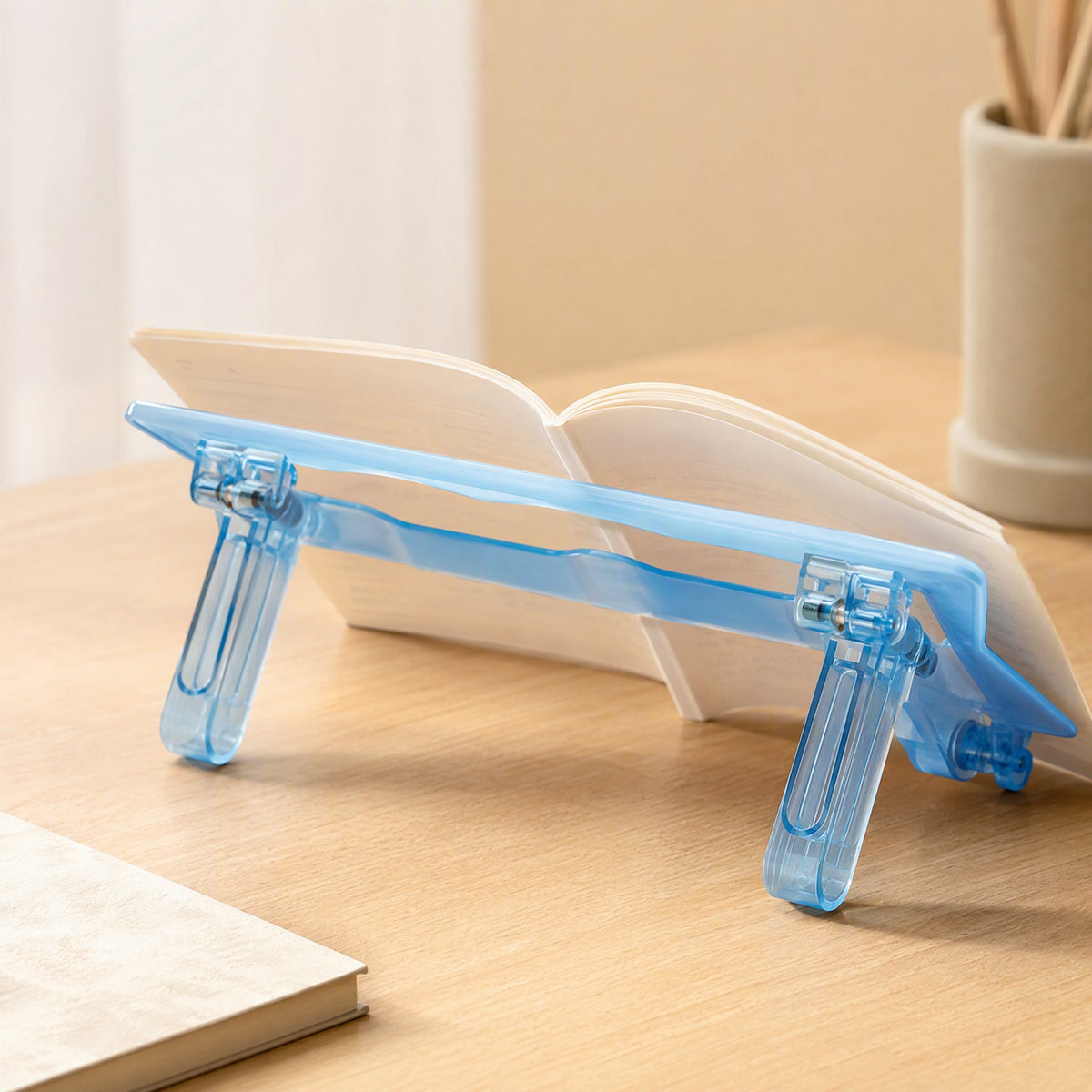 Foldleaf™ Foldable ABS Book Holder, styled close view