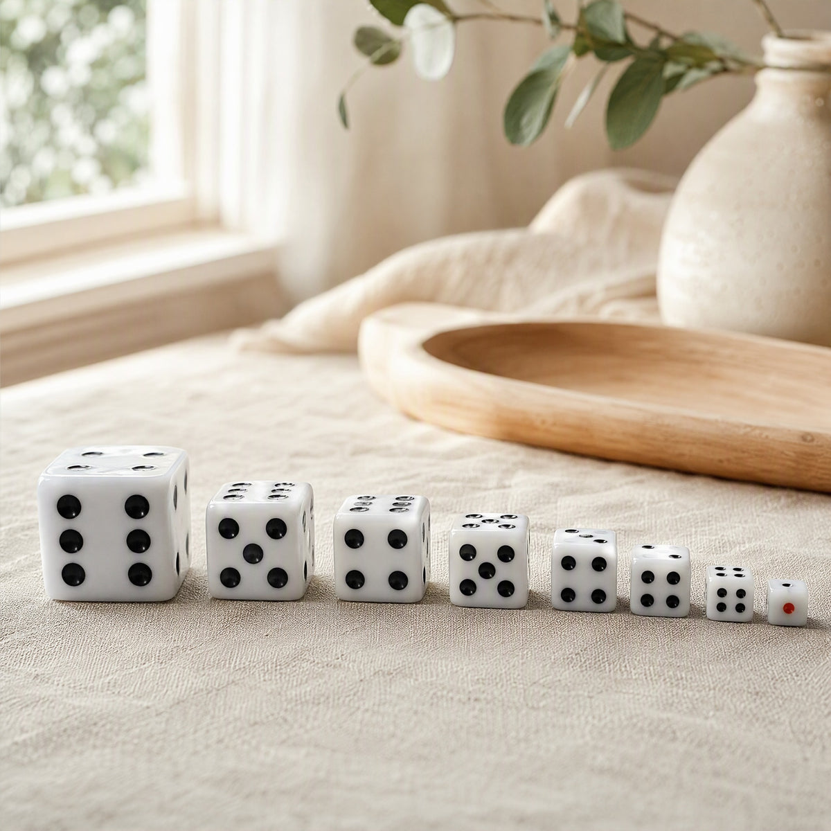 Squarepip™ White Acrylic Square Corner Dice in a calm home setting