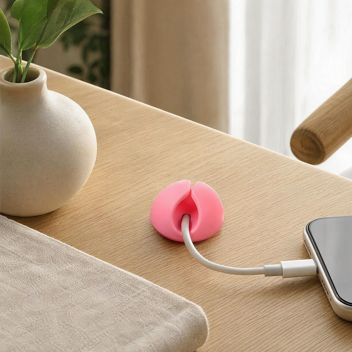 Cordtuck™ TPR Desktop Cable Organizer in a calm home setting