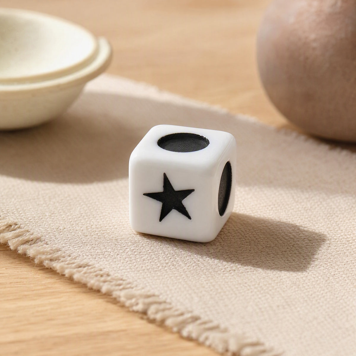 Starroll™ Acrylic Five-Pointed Star Dice, styled close view